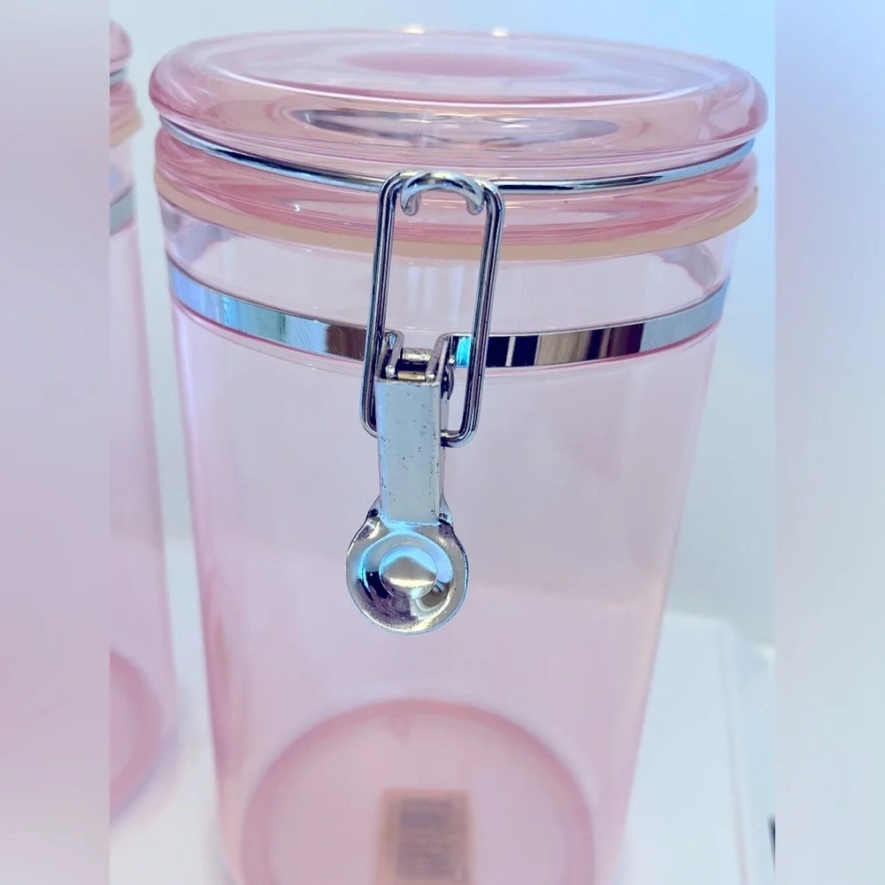 Two Vintage 85 Oz Pink Acrylic Airtight Jar Storage with Silver Clamp Closure.